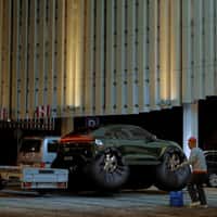 Porsche SUV Floats in Parking Lot