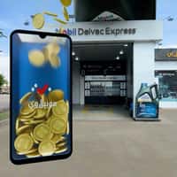 Mobil Giant Oil Bottle Pours Coins on Phone