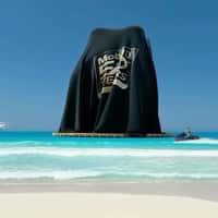 Mobil Giant Bottle on Beach