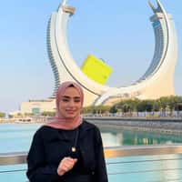 Gold Apple Giant Bag Glides at Katara Towers