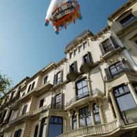 ISDIN SPF Products Spill from Giant Suitcase