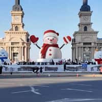 Kiehl's Harbin Giant Snowman Applies Cream