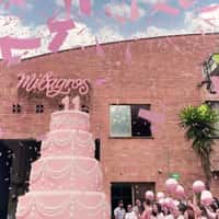 Milagros Giant Cake Lighted by Giant Matchstick