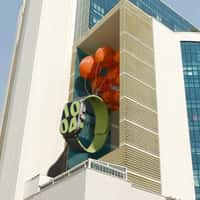 Hamrahnasl Massive Watch Emerges from Facade