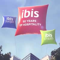Ibis Hotels Floating Throw Pillows Above Paris