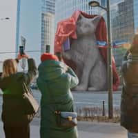 Motorola Giant Cat Sculpture Holding a Smartphone