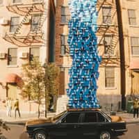 JD Sports Towering Shoeboxes on Car Roof
