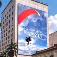 Reserva Paragliders Emerge from Billboard