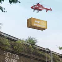 Budweiser Helicopter Airlifts Boxcar Over Flat Iron Square