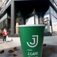 J.Cafe Giant Coffee Cup Falls from Above