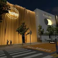 Vogue Giant Max Mara Buttons Roll Through Street