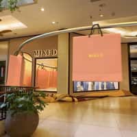 Mixed Giant Shopping Bags Glide to Store