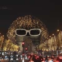 Michel Polnareff Giant Glasses and Wig at Arc de Triomphe