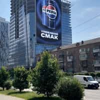 Pepsi Giant Can on Car Emerges from Billboard