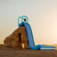 PlayStation Astro on Inflatable Slide in the Desert