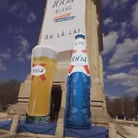 1664 Blanc Giant Beer Bottle Reveal at Arcul de Triumf