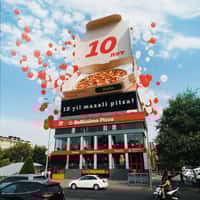 Bellissimo Pizza Giant Pizza Atop Store