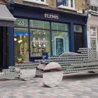 Elemis F1 Race Car of Jars Ride Through Street