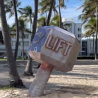Gymshark Giant Dumbbell on Sand