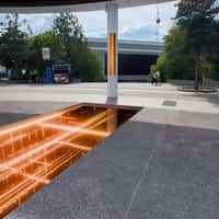 Orange Portal Opens from Pavement