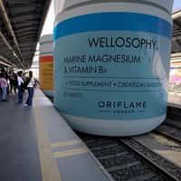 Oriflame Giant Bottles Glide on Train Tracks