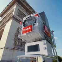 Vivax Giant Appliances Roll Past Arc de Triomphe