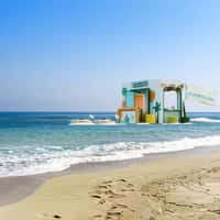 NBE Inflatable Kiosk Floats on Beach