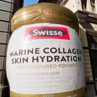 Swisse Beauty Giant Inflatable Jar Bursts