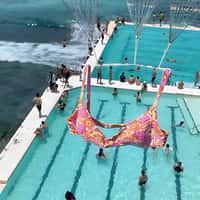Kulani Kinis Bikinis Parachute Landing on Beach