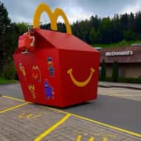 McDonald's Giant Happy Meal Box Glides Through Street