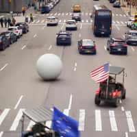 Ryder Cup Giant Golf Ball Rolls Through Street
