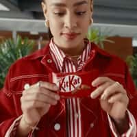 KitKat Woman Runs Away from Hovering Notifications