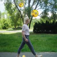 Lotto Woman Engages with Floating Number Balls