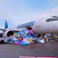 Discover Airlines Floaties Spill on Airport Tarmac