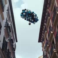 Liga F Balloons Airlifts Box Over City
