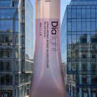 L’Oréal Giant Tube Towers Over City