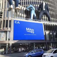 C&A Giant Denim Outfits Dance on Building Top