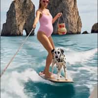 Malu Borges Wakeboarding With Dalmatian and Bag