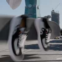 Unknowndomain Giant Sneakers Float by Taipei 101