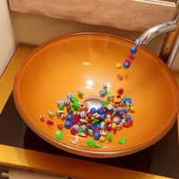 Candy Crush Candies Pour Out of Faucet
