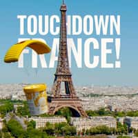 LEC Giant Ice Cream Tub Paraglides in Paris