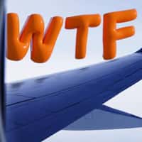 Kayak Giant WTF Balloons Float Above Airplane