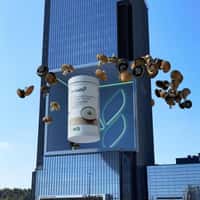Herbalife TV Giant Jar Emerges From Building