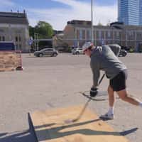 Veikkaus Hockey Puck Knocks Over Giant Blue Van