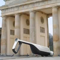 Roborock Vacuum Folding Under Brandenburg Gate