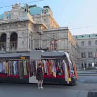 Vinted Tram with Hanging Clothes on Rack