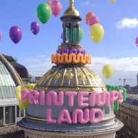 printemps Letter Balloons Float Over Tower of a Mall