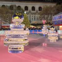 Tory Burch Perfume Bottles Ice Skating on Rink