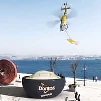 Doritos Chip Dipped In Sauce By Helicopter