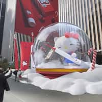Moon Hello Kitty Brushing Snow Globe